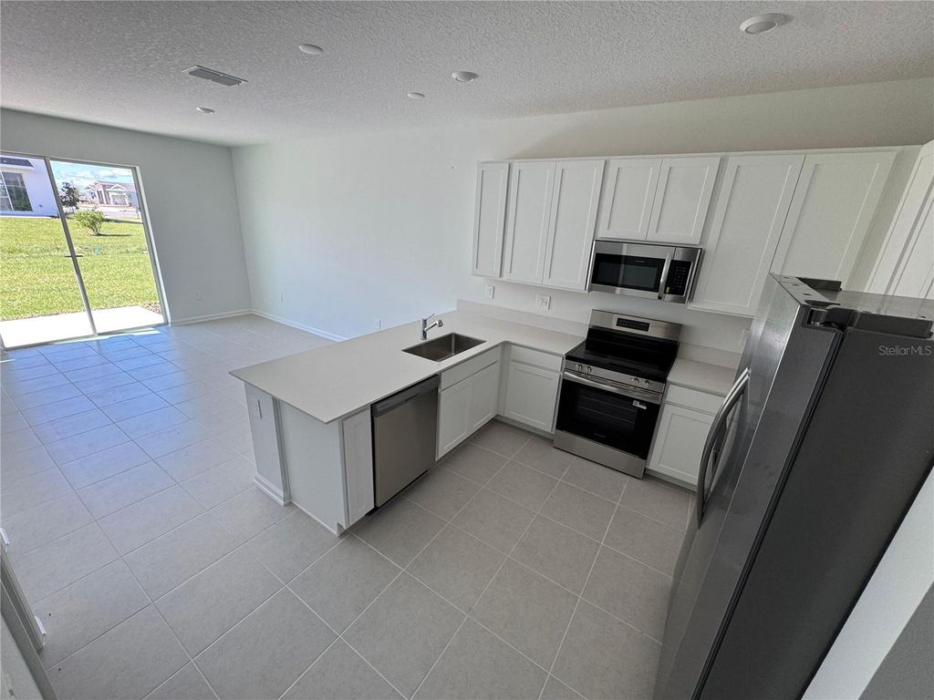 Photo of 5969 Zen Way, Clermont, FL 34714 (MLS # O6351739)