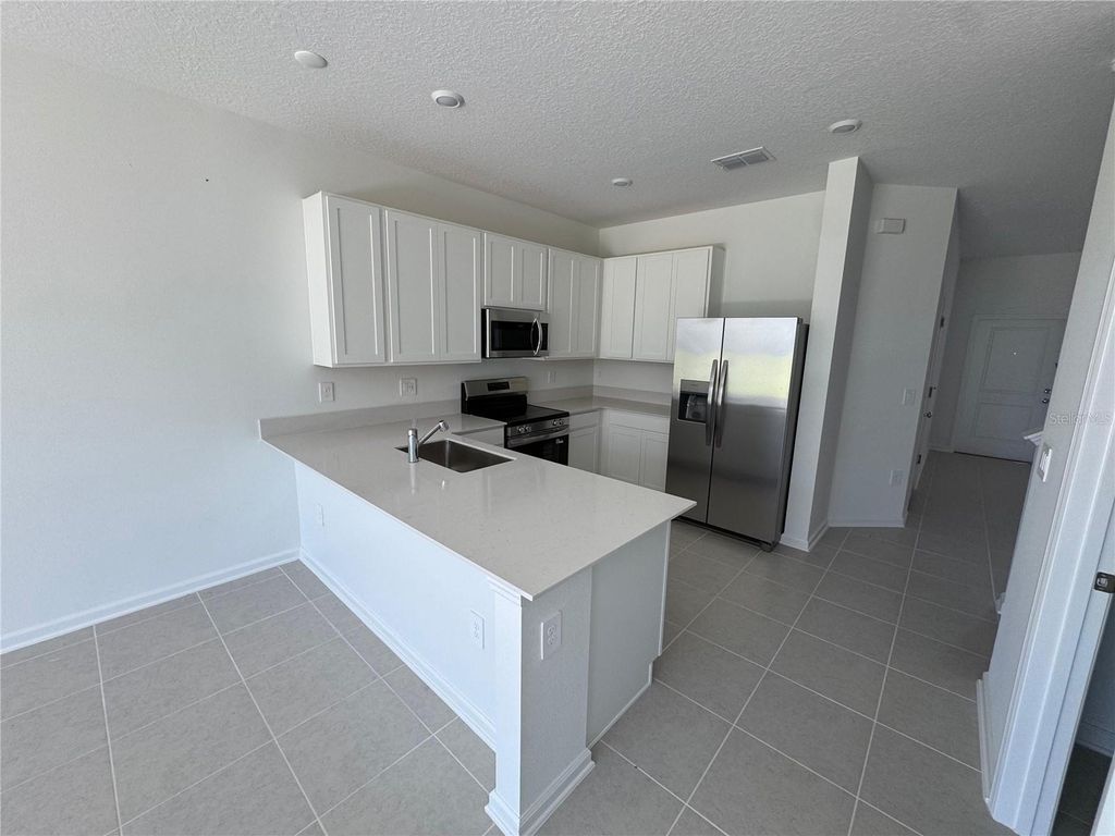 Photo of 5969 Zen Way, Clermont, FL 34714 (MLS # O6351739)