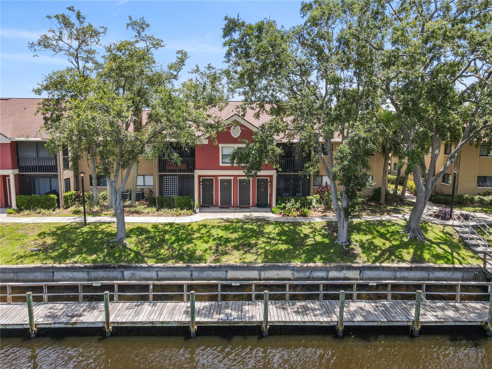 Welcome to our Fully Renovated, ALL-Ages, PET-Friendly Waterfront Condo--complete with an IN-UNIT Washer/Dryer, Assigned BOAT Slip, with Ultra-Low HOA Fees! This beautifully Updated (2) Bed + DEN, (2) Bath Corner Unit offers a Modern Style, High-End Components, with Serene Water Views from nearly every room. Inside, you'll find High-End Upgrades including fresh Paint, elegant TILE Flooring, Decor Fans, Fixtures, Trims, & Moldings throughout. The OPEN-Concept living space is Bright and Airy, featuring Vaulted Ceilings and a private screened Balcony overlooking the water. The fully Remodeled Kitchen is a Chef’s Dream--showcasing GRANITE countertops, Stainless Appliances, and REAL Wood Cabinetry. The spacious Primary Suite includes a large WALK-IN Closet, a completely renovated en-suite BATH, with plenty of room for your KING-sized furnishings. The Gallery at Bayport is ideally located and rich in amenities. This centrally located gated community offers direct water access for boating, fishing, and kayaking. Stroll along the private dock, where you can often spot dolphins playing, manatees meandering, and neighbors enjoying the water--whether casting a line or heading out by boat to explore our beautiful Tampa Bay. The canal behind the condo connects to the Bay & leads to the Gulf, making this a true paradise for all water lovers. The Gallery’s prime location places you just minutes from Tampa International Airport, International Plaza, and Tampa Bay's vibrant Downtown. Enjoy fast access to Interstates, Sports Venues, Theaters, the Florida Aquarium, pristine Beaches, and a diverse selection of top-rated Restaurants, Shopping, & Entertainment. Association fees are ONLY $433 a month and cover the Community Gate, Building Exterior & Roofs, Waterfront Clubhouse, Fitness Center, Dog Park, Pool, Spa, Tennis court, Water, Sewer, and Trash. This Fully Renovated, BOAT-Ready Unit is Priced to Sell! Experience stylish and serene Waterfront Living at an Incredible Price. Don't miss this opportunity! Call now to schedule your private showing!