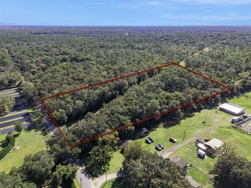 Discover a rare 4.8-acre wooded estate parcel in the highly desirable Wekiva Forest Trails, backing directly to Wekiwa Springs State Park. This exceptional homesite offers unmatched privacy surrounded by mature trees, natural beauty, and abundant greenery but just minutes from town.

As part of the Wekiva Forest Trails Planned Development (PD) and zoned A-2 (Farmland Rural), the property blends flexibility with preservation. One of only eight estate-style parcels, in a community where custom homes regularly exceed $1 million, maintaining low-density design standards and timeless rural character.
With utilities nearby, no HOA, and a minimum 4-acre lot size, there’s ample room to build your custom home, guest house, pool, gardens, or additional structures. A-2 zoning also permits horses and select farm animals, offering the opportunity to create a refined equestrian or hobby-style retreat with space for a stable, riding area, and pasture. Enjoy kayaking, hiking, and wildlife just minutes away at Wekiwa Springs, Kelly Park, and Rock Springs Run, plus easy access to SR 436, SR 429, and downtown Apopka for shopping, dining, and top-rated schools.