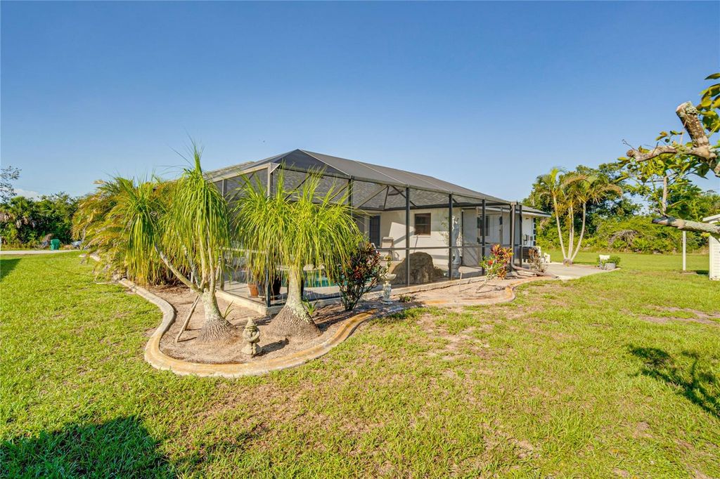 Photo of 12038 Florence Avenue, Port Charlotte, FL 33981 (MLS # O6395548)