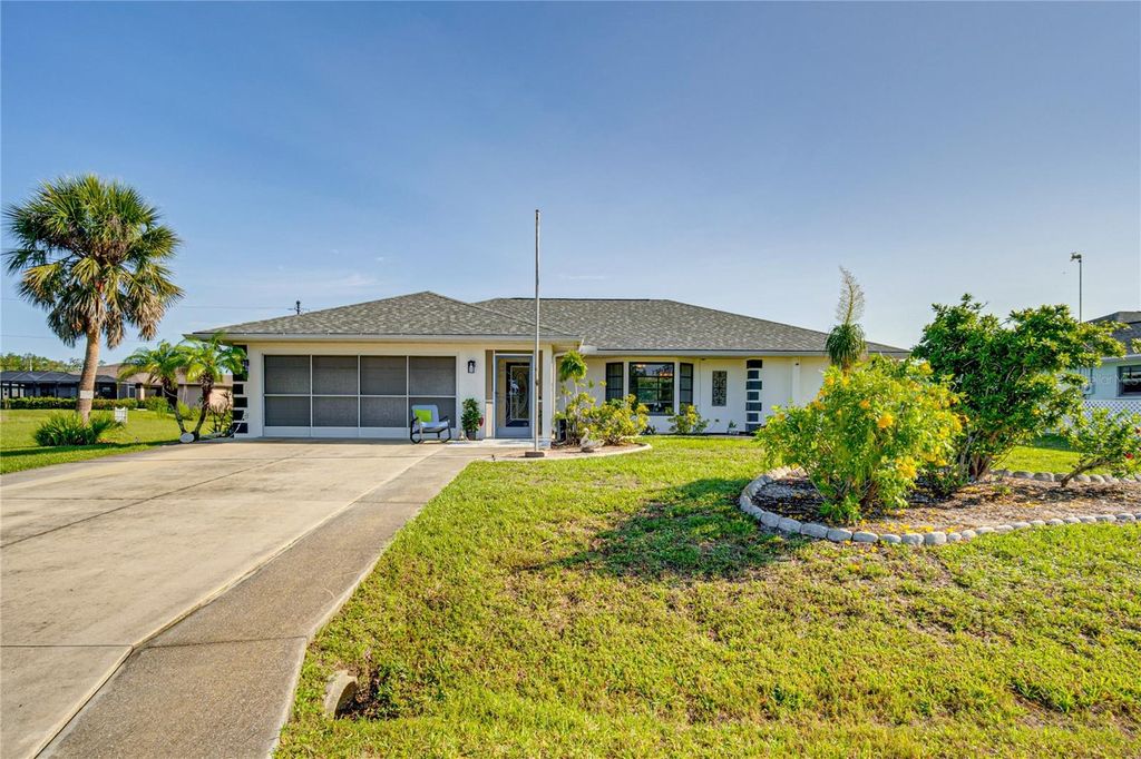 Photo of 12038 Florence Avenue, Port Charlotte, FL 33981 (MLS # O6395548)