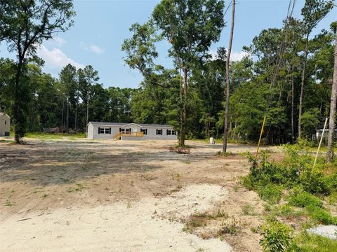 Photo of 7180 Hwy 90, Live Oak, FL 32060 (MLS # W7877512)