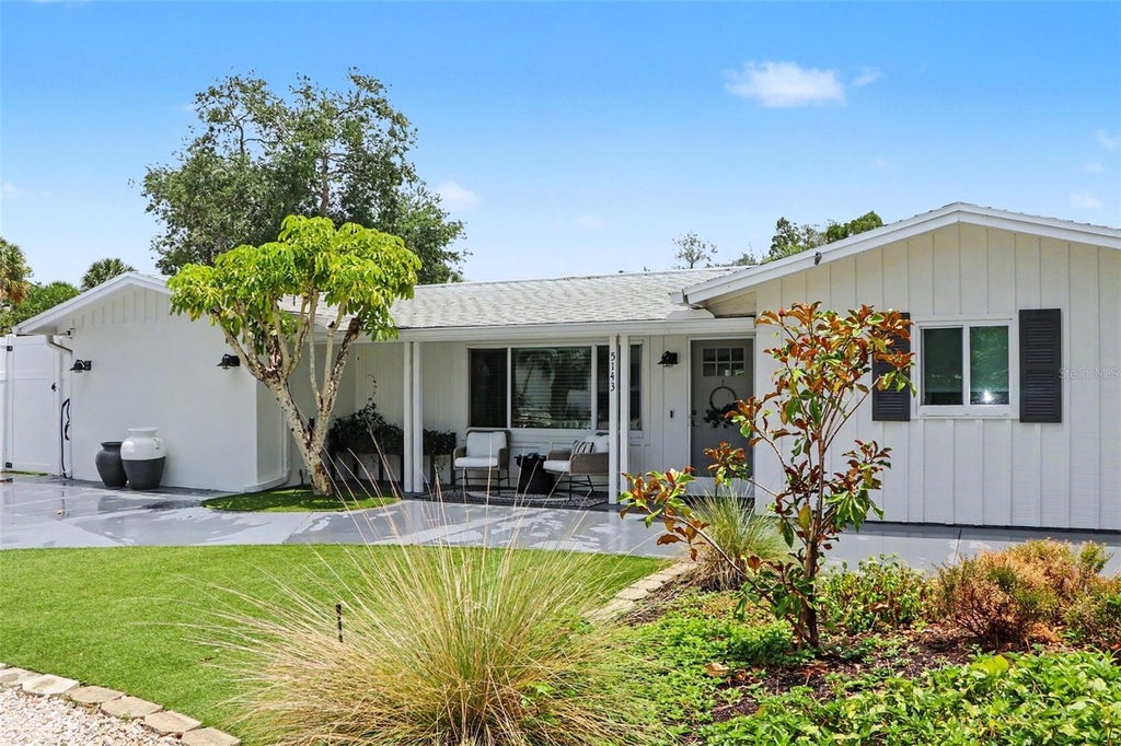 Photo of 5143 Sandy Beach Avenue, Sarasota, FL 34242 (MLS # TB8533327)