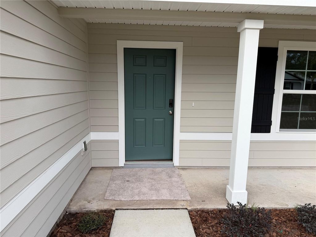 Photo of 48 Reidsville Drive, Palm Coast, FL 32164 (MLS # FC314944)