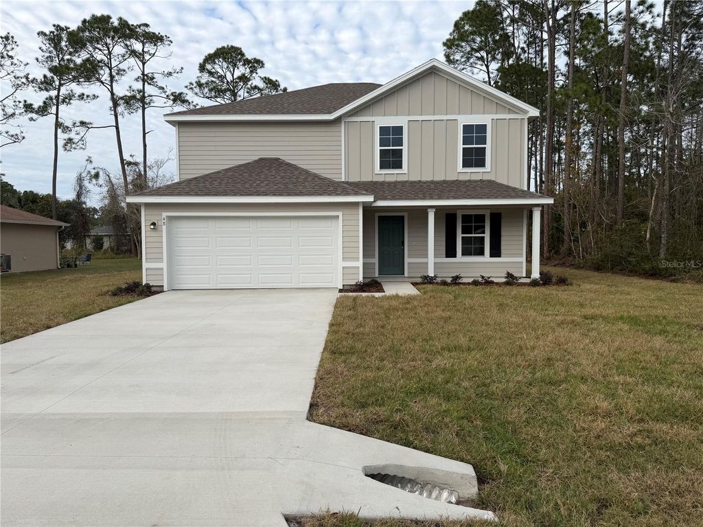 Photo of 48 Reidsville Drive, Palm Coast, FL 32164 (MLS # FC314944)