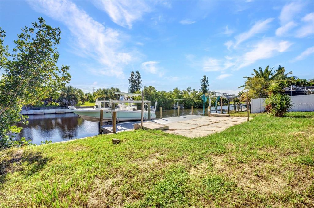 Photo of 181 Duxbury Avenue, Port Charlotte, FL 33952 (MLS # C7514160)