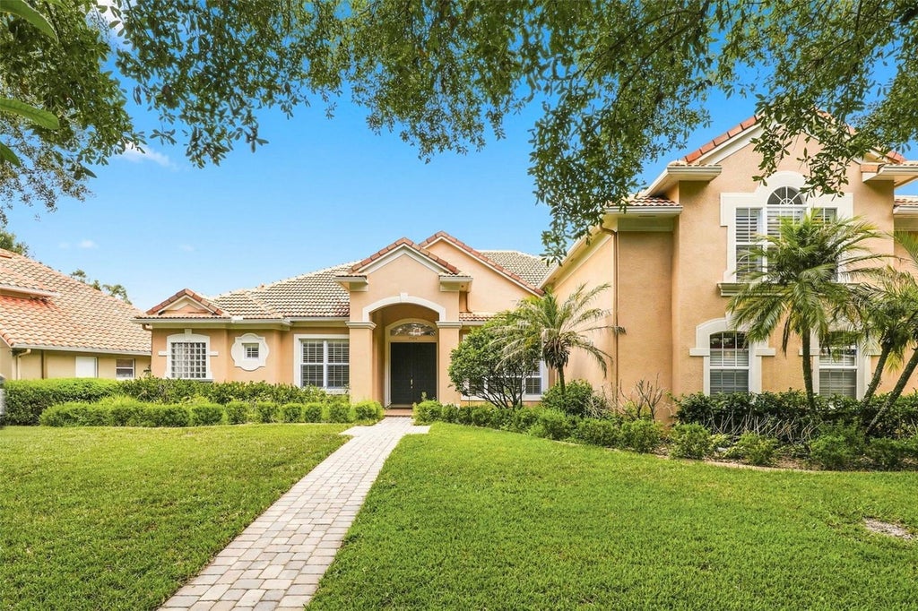 Photo of 7746 Debeaubien Drive, Orlando, FL 32835 (MLS # O6432920)
