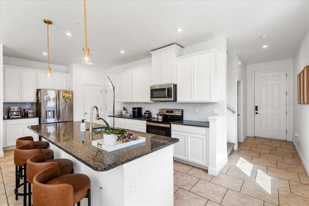 Photo of 2759 Pleasant Cypress Circle, Kissimmee, FL 34741 (MLS # O6420541)