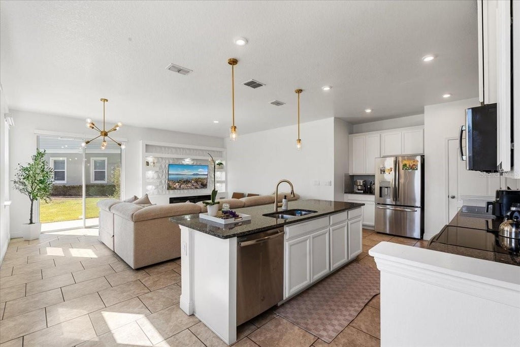 Photo of 2759 Pleasant Cypress Circle, Kissimmee, FL 34741 (MLS # O6420541)