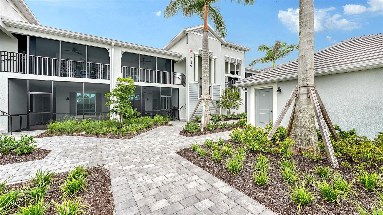 Beautiful brand-new 2- bedroom, 2-bathroom Veranda offers chic coastal furnishings in soothing color palette. Stunning fairway and preserve views greet you as you enter the condo which is located within the sought after gated community of Wellen Park Golf and Country club. This newly decorated, condo features 1,680 square feet of well thought out living space and features a screened in front and rear lanai for enjoying gorgeous sunny days and cross breezes and entertaining guests. Master suite boasts walk in closets, en-suite bath with double sinks and large walk-in shower. Second bedroom and den share a full size second bathroom with bathtub/shower combo, quartz countertops and vanity. Nicely appointed kitchen features large island, quartz counter tops, wood cabinets and stainless-steel appliances with functional pantry that shares space with living and dining areas. This clever floor plan features den with pocket doors, offering a multi-functional space for additional guest quarters or office/working space. A detached one car garage is located conveniently in front of the condominium and offers easy access, just steps from the front door of this ground floor unit. All bedrooms have a television as well as the living room and lanai. King bed in master, queen bed in second bedroom and pull- out sofa in the den. Hurricane impact resistant windows and doors are featured. Take your love of the game to the next level on the newest Gordon Lewis championship golf course. Property is being offered with golf membership as well as access to resort style amenities such as main resort style pool, 3 satellite pools, fitness center, tiki bar, pickle ball, tennis courts, bocce ball and a dog park. This community is located in close proximity to downtown Wellen Park, which offers an array of shops, music events, restaurants, lake, walking trails, kayak and paddle board rentals, farmers market, and more. Nearby Gulf beaches, downtown Venice and Atlanta Braves spring training facility. ***HIGH SEASON (DEC-APRIL) RATE~ $6,500.00 PER MONTH*** LOW SEASON (MAY-NOV.)***
Immediate occupancy.