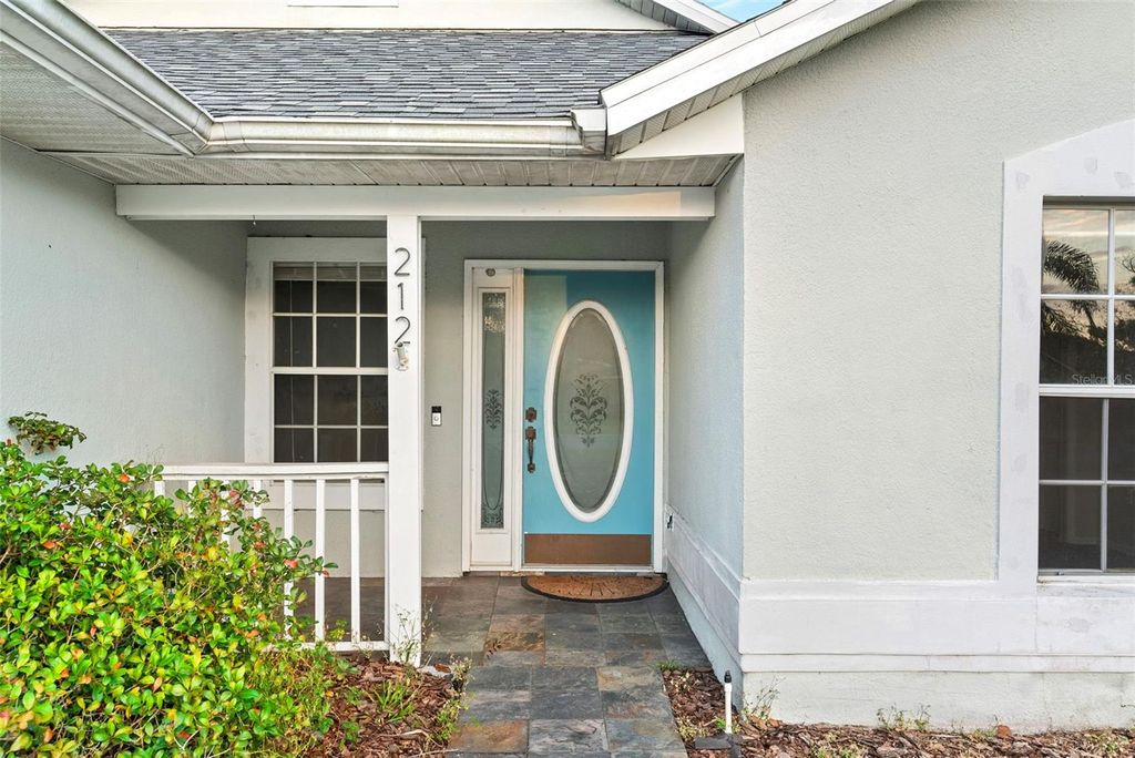 Photo of 212 Bent Oak Loop, Davenport, FL 33837 (MLS # O6404720)
