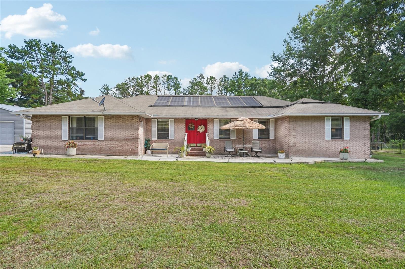 ATTENTION VETERANS!! If you are a veteran, you can assume this loan at a 2.6 interest rate. - Welcome to your private equestrian retreat! Nestled on 5 fully fenced acres, this beautifully maintained 4-bedroom, 2-bathroom home,with a full mother-in-law suite, is perfect for those seeking space, tranquility, and functionality. Whether you're an avid rider or simply love the peace of country life, this property delivers.
Inside, you’ll find a warm and inviting layout ideal for family living and entertaining. The spacious kitchen and living areas open up to a stunning backyard oasis complete with a refreshing pool—powered by a new pump (2021)—perfect for relaxing after a day outdoors.
The property is set up for your horses with ample space for stables, paddocks, and training. With room to expand or simply enjoy the open land, this farm offers flexibility to make it your own.
Don’t miss this rare opportunity to own a move-in-ready horse property with endless potential!
Roof (2014), A/C (2017), water heater (2017), well pump (2021), and septic field (2015).
* New pictures coming soon!