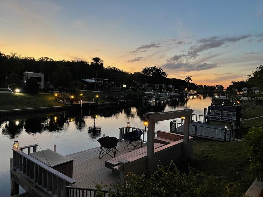 WATERFRONT RV LOT with Private Dock!!  WELCOME TO RIVER RANCH RV RESORT, Florida’s Luxury RV Resort with access to Lake Kissimmee!  This privately owned RV lot is located in Phase 5 and is DIRECT WATERFRONT! Rent this Lot out when you are not using it!  If you have ever wanted to be able to jump on your boat and spend the day fishing or Lake cruising, this is the RV Lot for you!  This Lot offers a NEW pavilion allowing you to Camp rain or shine!  There is electricity, fans, a TV and it is plumbed for you to build the outdoor kitchen of your dreams!  There is also a full size shed on the property for your storage needs.  Store your watercraft on your private dock (direct access to chain of lakes) and spend the evenings enjoying the calmness of the river on your own private dock with built in seating!   This lot offers shade and sun  - the perfect combination!   River Ranch RV Resort is perfect for weekend vacations, family camping, seasonal living! River Ranch RV Resort offers beautiful landscaping and privately owned RV lots.  There are many amenities such as Pools, Tennis, Pickle Ball, Clubhouse, Social Events, Billiards, Poker Room and more!  WHY BUY AT RIVER RANCH? Turnkey Rental Income Opportunity, High-Demand Vacation Destination, Privately Owned RV Lots – Perfect for weekend getaways or full-time living!

Looking for entertainment and fun? River Ranch offers it here!! For starters, there is a LIVE Rodeo every Saturday night – an excellent display of showmanship and fun for the entire family! There is even a Saloon (family friendly), with LIVE bands, DJs, dance parties and they give line dancing lessons for free. There is a waterpark, an adventure park which has a bounce house, mechanical bull, climbing tower, Arcade, mini golf, outside movie on the greens, bicycle rentals, airboat rides, river boat rides, swamp buggy, hayrides, petting farm, trap & skeet range and a bow target for shooting. There are several places to eat on property. The River Ranch Chop House serves delicious food and drinks, a waterfront Smokehouse Grill serving delicious BBQ, a pizza shop and an ice cream and coffee shop (serving Starbucks.) There is also a General store and a Western store to grab all of your favorite Cowboy/Cowgirl finds! Watch the Bison, Steers, Horses and other wildlife! Don’t forget to check out the Petting Farm!!