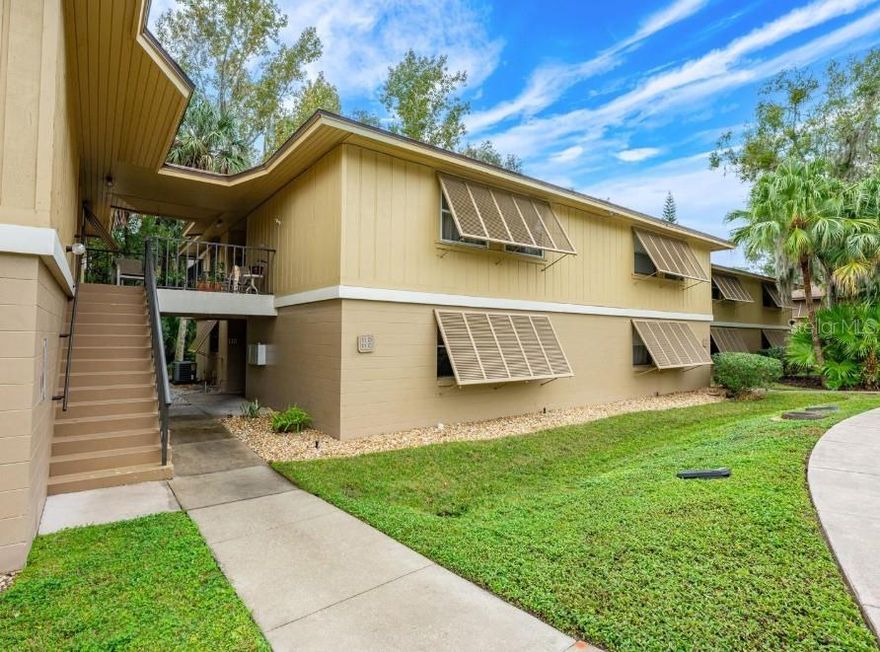 Welcome to Lakeside Condos — a peaceful, wooded lakeside community nestled along beautiful Lake Monroe in Deltona. This updated 2-bedroom, 2-bath second-floor condo offers the perfect blend of comfort, convenience, and low-maintenance Florida living. Ideally located just steps from the community pool, tennis courts, scenic walking trails, Thornby Park, Green Springs Park, and the East Central Regional Rail Trail, this home is perfect for those who enjoy an active outdoor lifestyle.

Inside, you’ll find a bright and functional open living and dining area filled with natural light, featuring luxury vinyl plank and wood-look flooring throughout for easy maintenance and modern appeal. The spacious screened and enclosed porch provides additional living space and a relaxing spot to unwind while enjoying the peaceful surroundings. The kitchen comes fully equipped with refrigerator, range, dishwasher, and a stacked washer and dryer for added convenience. Recent updates include refreshed interior finishes, newer HVAC system, and water heater, making this home truly move-in ready.

Residents enjoy a beautifully landscaped community with a tropical-style pool and spa, tennis courts, designated parking, and direct access to Lake Monroe with a public boat ramp just across the street. Conveniently located within walking distance to Publix, restaurants, parks, and shopping, with easy access to I-4 and Highway 17-92 for quick commutes to Orlando, Sanford, and the beaches.

Please note: Association approval and renter’s insurance are required. This is a no-pet community and motorcycles are not permitted.