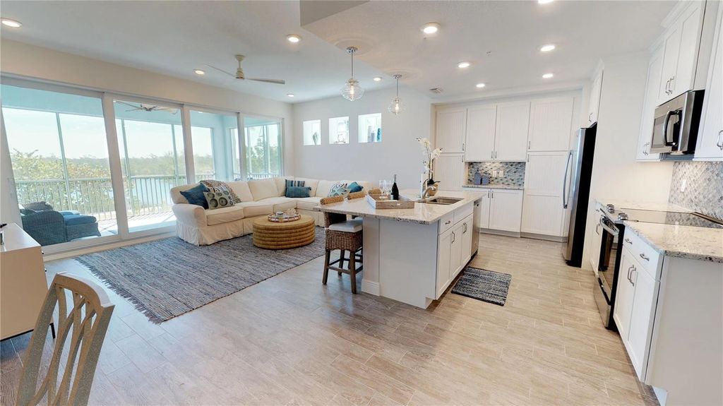 Photo of 387 Aruba Circle #103, Bradenton, FL 34209 (MLS # A4692563)