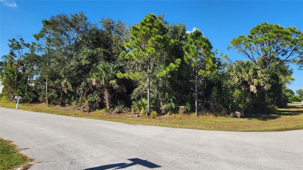 Photo of 12062 Coleman Avenue, Port Charlotte, FL 33981 (MLS # C7518110)