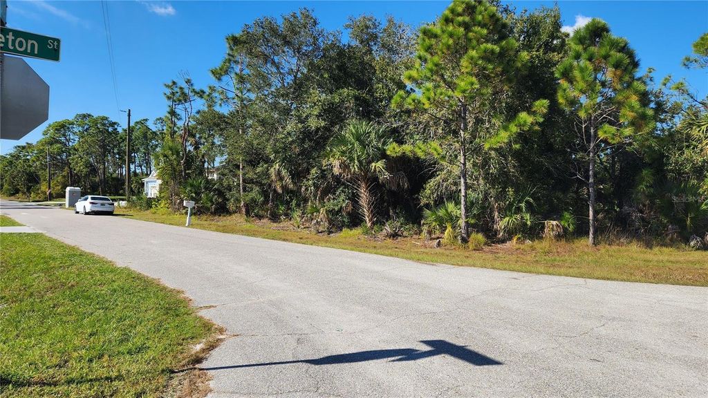 Photo of 12062 Coleman Avenue, Port Charlotte, FL 33981 (MLS # C7518110)