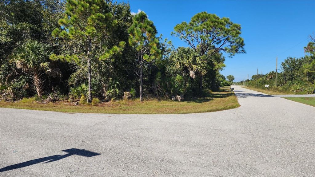 Photo of 12062 Coleman Avenue, Port Charlotte, FL 33981 (MLS # C7518110)