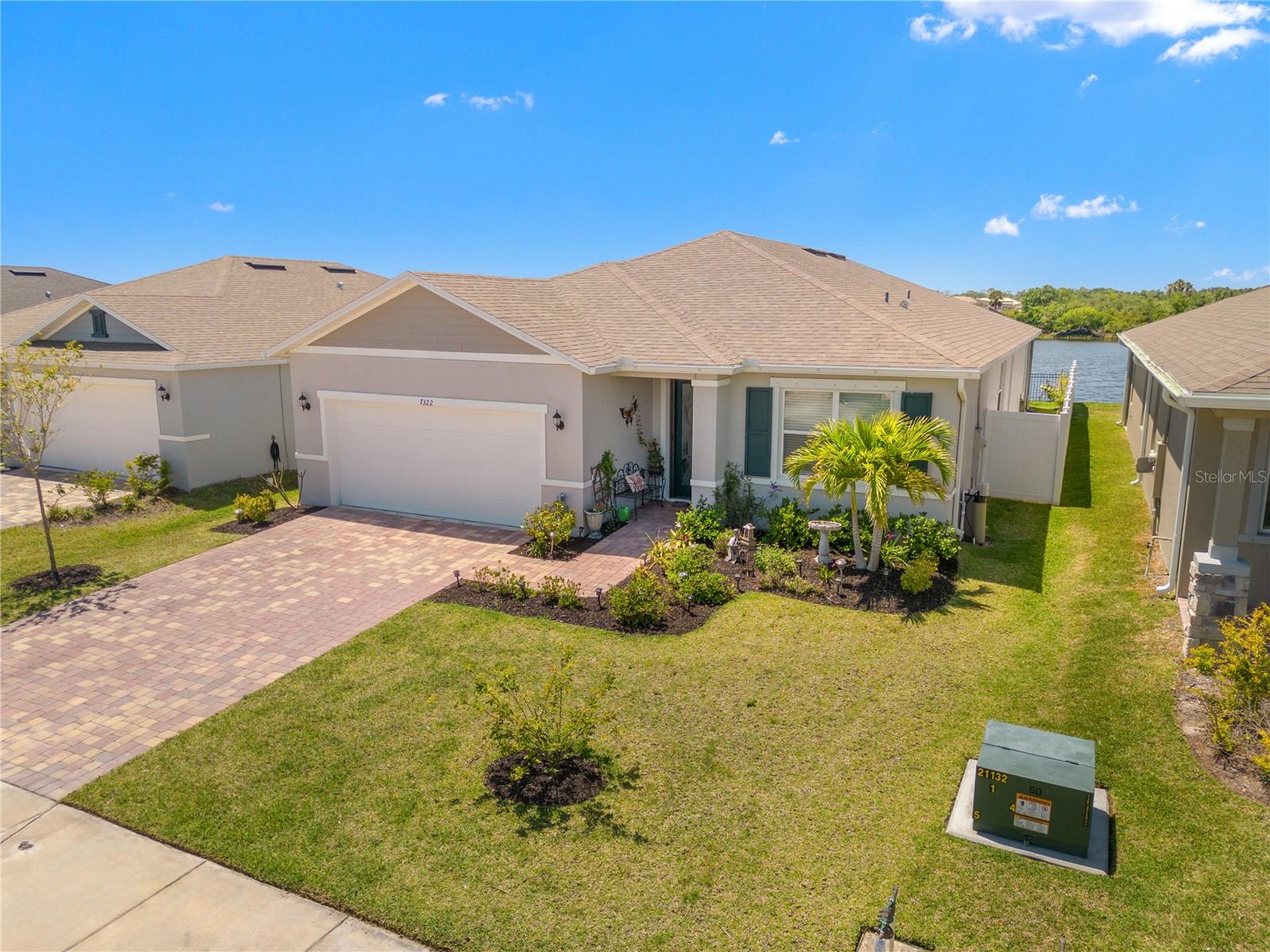Welcome to 7322 34th Ct E in Sarasota, Florida, where SUNSETS NEVER GET OLD and every detail has been thoughtfully curated for modern living. Built in 2023 and situated on a quiet cul-de-sac, this BETTER-THAN-NEW HOME offers 2,333 SQ FT of luxurious, open-concept living with 4 spacious bedrooms and 3 beautifully appointed baths.
Step through the inviting front porch and into an impressive foyer that leads to three generously sized secondary bedrooms, a full bath, and a dedicated laundry room—ideal for guests or a growing family. The heart of the home is the expansive GREAT ROOM with 9-FT. STEP CEILINGS, seamlessly connecting to the CHEF’S KITCHEN and open dining area, perfect for entertaining.
The kitchen is a culinary masterpiece featuring:
UPGRADED LG DOUBLE OVEN •
LG ThinQ SMART REFRIGERATOR •
MAYTAG WASHER & DRYER •
GRANITE COUNTERTOPS & XL GRANITE SINK •
30-IN. UPPER CABINETS & WALK-IN PANTRY •
LARGE EAT-AT ISLAND FOR GATHERINGS •
Relax in your PRIMARY SUITE RETREAT complete with a LARGE WALK-IN CLOSET and a spa-inspired en-suite bath featuring a DUAL SINK VANITY with GRANITE COUNTERS, a WALK-IN SHOWER, and a REMODELED JETTED JACUZZI/AIR BUBBLE SPA TUB WITH HEATER AND LIFETIME WARRANTY—your private sanctuary after a long day.
Enjoy the best of Florida’s indoor-outdoor lifestyle on the EXTENDED SCREENED-IN LANAI, featuring a NEW CONCRETE FLOOR AND FRAME INSTALLATION and a cooling OUTDOOR CEILING FAN—perfect for relaxing evenings or entertaining under the stars. The NEW VINYL & ALUMINUM FENCE provides privacy and security, while the SEALED PAVERS add an upscale finish to your outdoor space.
Additional Upgrades & Features:
WHOLE-HOUSE WATER FILTRATION & CONDITIONING SYSTEM •
ELECTRIC PANEL SURGE PROTECTOR •
SMART RHEEM WATER HEATER •
RING DOORBELL & ALARM SYSTEM WITH DOOR/WINDOW SENSORS •
KEYLESS ENTRY & FRONT DOOR IMPACT GLASS WITH RETRACTABLE SCREEN •
FOUR INDOOR CEILING FANS & SAFETY HANDLES IN GUEST BATH •
GARAGE STORAGE SHELVING FOR ORGANIZED LIVING •
LANDSCAPE SAVING GUTTERS
Some furnishings MAY CONVEY at the buyer’s preference, making this incredible home truly MOVE-IN READY. Why wait to build when this meticulously upgraded, better-than-new home is waiting for you NOW?
Schedule your private tour today and experience the perfect blend of elegance, comfort, and thoughtful upgrades—this is the Florida lifestyle you’ve been dreaming of!
