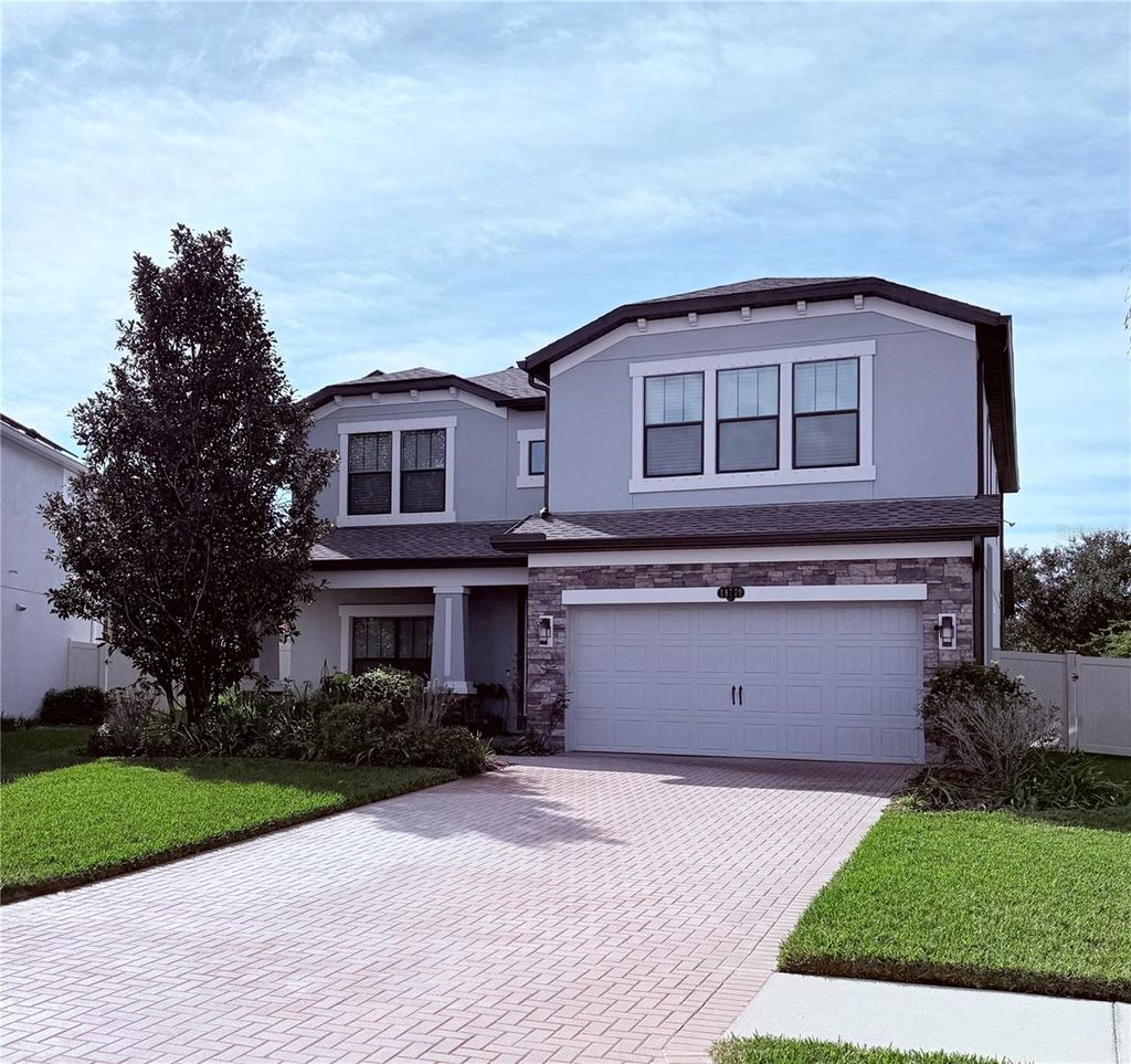 Photo of 18779 Deer Tracks Loop, Lutz, FL 33558 (MLS # TB8457485)