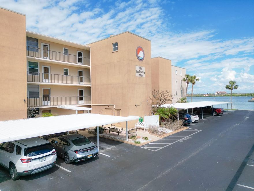 Welcome to your updated waterfront retreat in the highly sought-after Bay Island, a 55+ gated community in South Pasadena. Located in the Yorktown building, this beautifully maintained one-bedroom, one-and-a-half-bath condo offers a perfect blend of comfort and coastal living. The bright, open layout features luxury vinyl flooring, a modern kitchen with quartz countertops, breakfast bar, and updated bathrooms with stylish finishes. Natural light fills the living space and leads to your private screened balcony, where you can relax and enjoy peaceful water views of Boca Ciega Bay. The spacious bedroom provides a tranquil retreat with ample closet space and a private en-suite bath, while the additional half bath adds convenience for guests. An in-unit laundry enhances everyday ease, and hurricane-impact windows and sliders add peace of mind and energy efficiency. One small dog or cat may be considered at the landlord’s discretion with association approval. Enjoy resort-style amenities including multiple pools, tennis and pickleball courts, fitness centers, and a scenic waterfront walking path—all just five minutes to famous St. Pete Beach and 15 minutes to vibrant downtown St. Pete, with dining and shopping nearby. Available for long-term rental at this rate.