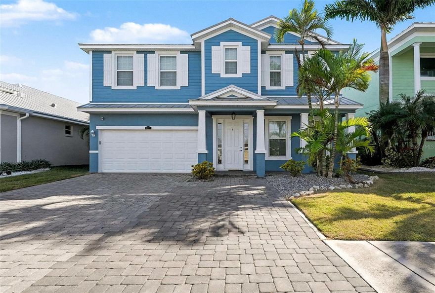 2.75% Assumable VA with Roam! This gorgeous two-story home is nestled in a tranquil gated, waterfront community of Bimini Bay which is situated in the heart of Apollo Beach. Welcome to your very own coastal oasis home offering a captivating blend of enchanting natural beauty and tranquil views. Nestled in a charming small town with easy access to the bay, this home offers the perfect blend of comfort, style, and functionality for family living and entertaining. Discover unparalleled coastal luxury in this beautifully appointed 4-bedroom, 2.5-bath with formal dining room, living room, family room, and oversized primary bedroom. Designed for refined living, this home welcomes you with soaring ceilings, elegant architectural details, and a bright, open floor plan. The main level features a sophisticated formal dining room, a spacious living area with a breakfast nook open to the kitchen, and a converted private office ideal for remote work .Upstairs, you’ll find all four generously sized bedrooms, along with a large bonus room perfect for a media room, playroom, or additional lounge space. The luxurious primary suite includes an extra seating area, an expansive walk-in closet, and a spa-inspired bathroom with dual sinks, a separate garden tub, and a walk-in shower. For added convenience, the laundry room is located upstairs, close to all bedrooms .Outdoor living is equally impressive. Enjoy a covered lanai with a premium hot tub, overlooking the fully fenced backyard—perfect for relaxation or entertaining. Boating enthusiasts will appreciate the direct access to a saltwater canal, complete with a 10,000-lb boat lift, dock with power and water, and an electric lift. With minutes to open water, this home delivers the ultimate Florida boating lifestyle. Enjoy true Florida living with both style and convenience! The home’s metal roof adds both modern appeal and exceptional longevity. Private gated community with low HOA & NO CDD. Conveniently located near restaurants, shopping, schools, Downtown Tampa, Busch Gardens, MacDill Airforce, Selmon Expressway, I75, I4, US41 & US301. Call today!