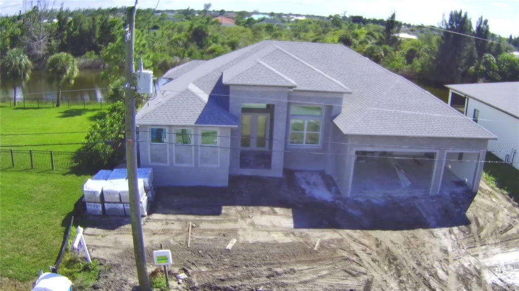 Photo of 15708 Autry Circle, Port Charlotte, FL 33981 (MLS # D6149193)