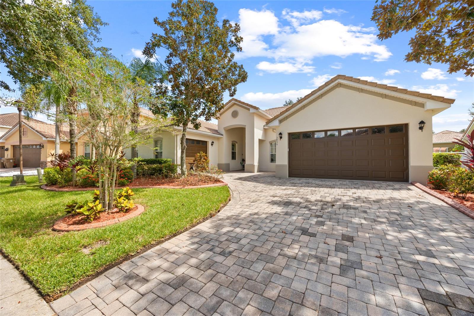 Welcome to this beautifully maintained 4-bedroom, 3-bath single-level home in the sought-after, resort-style Bellalago Community in Kissimmee! This furnished home sits on an oversized .24-acre lot, offering plenty of space to add a pool and enjoy the best of Florida outdoor living. Inside, you'll find a spacious open-concept layout with new laminate flooring in all bedrooms, elegant plantation shutters, and a split floor plan for added privacy. The chef’s kitchen boasts granite countertops, a pantry, a center island, and stainless steel appliances—including a new dishwasher and microwave, plus a 2-year-old range. It opens to the family room and dinette area, creating a perfect space for entertaining and family gatherings. The Master Suite boasts a tray ceiling, two walk-in closets, and new flooring, while the luxurious master bath includes dual marble vanities, a relaxing jacuzzi tub, and a glass-enclosed shower. The 2nd bedroom features double doors, making it ideal for a home office or flex space. The 4th bedroom has its own full bath and private entry from the lanai—perfect for an in-law suite or guest quarters. Additional features include a new thermostat, and water heater. The 3-car garage provides ample space for vehicles, storage, or even a home gym setup. Located in a gated community with 24-hour manned security, Bellalago offers a secure and vibrant lifestyle with no CDD! HOA includes cable and internet, and the irrigation system uses recycled water for big savings. Living in Bellalago means access to premier, resort-style amenities, including: 24/7 gated manned access, a Junior Olympic-sized pool and water park, the Fishing piers, boat lift, and slip access to Lake Toho, a State-of-the-art fitness center, Tennis, basketball, and volleyball courts, Scenic walking and biking trails and so much more! Close proximity to Disney! This home is move-in ready—perfect for year-round living or as a vacation retreat.