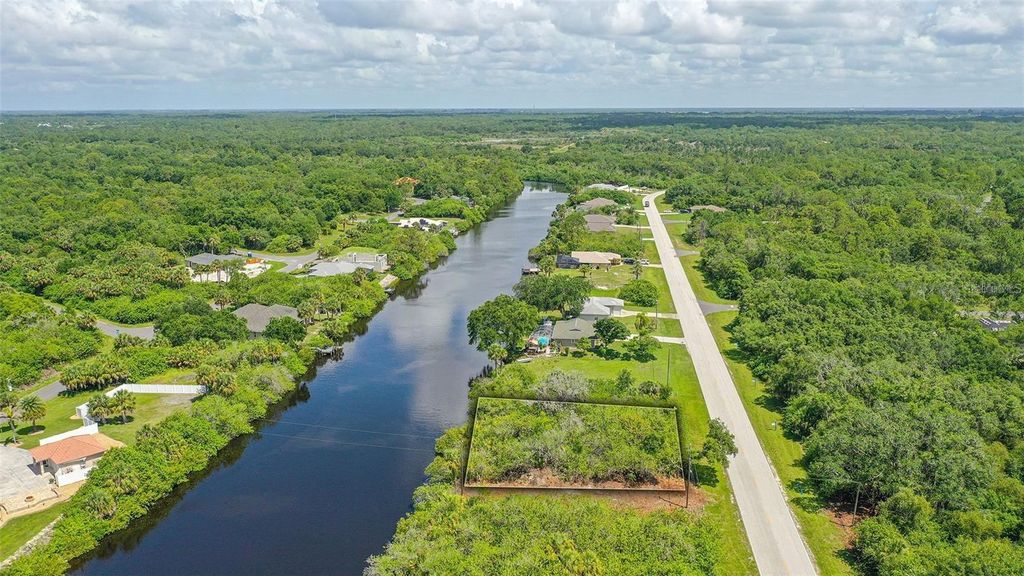 Photo of 2207 Cornelius Boulevard, Port Charlotte, FL 33953 (MLS # A4572384)