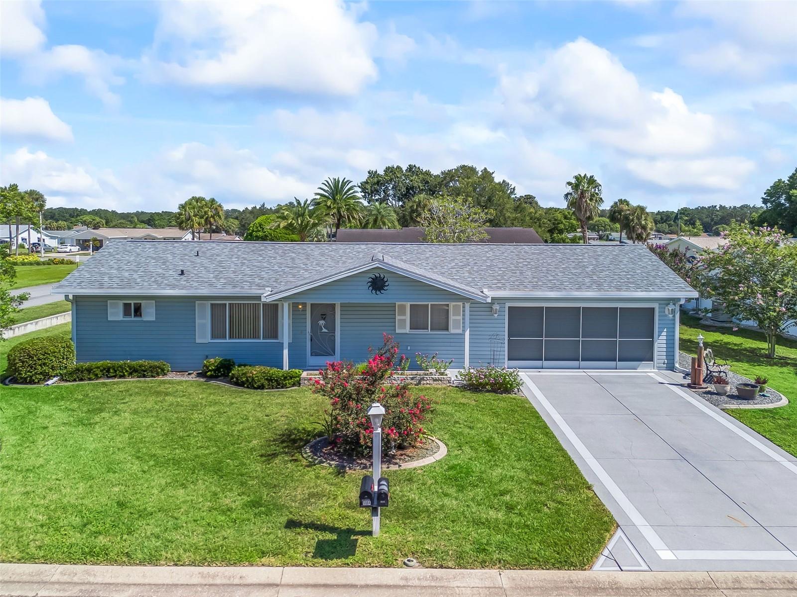 GREAT LOCATION in SPRUCE CREEK SOUTH near all the essential amenities! This desirable Maple model sits on a corner lot (.19 acres) and offers a comfortable 2 bedroom / 2 bath / 2-car garage (20x24) plus a golf cart garage (10x10) conveniently attached at the rear of the home. Enjoy relaxing on the front covered porch (5x18) or in the enclosed Florida room (10x15) overlooking the spacious backyard and patio.
Inside, you’ll love the split floor plan and the many updates: NEW roof (2024), HVAC (2017), newer washer and dryer, updated tall kitchen cabinets with soft-close drawers, granite countertops, and granite vanity tops in both bathrooms. The primary bath features an updated walk-in shower.
The laundry area is in the garage, complete with a utility sink, screen on the garage door, ceiling fan, and built-in cabinets. Both bedrooms feature ceiling fans with light fixtures.
Spruce Creek South is a gated 55+ community (at least one homeowner must be 55+) offering an active lifestyle near the clubhouse with recreation including a swimming pool, fitness room, billiards, pickleball courts, softball clubs, and more. The challanging "Links" at Spruce Creek South is an 18 hole facility designed by course architech, Terry Doss.
Whether you’re looking for a winter retreat or a smaller home to enjoy year-round, this could be the perfect fit! Quick close possible—ask your REALTOR® how to make this home yours today!
