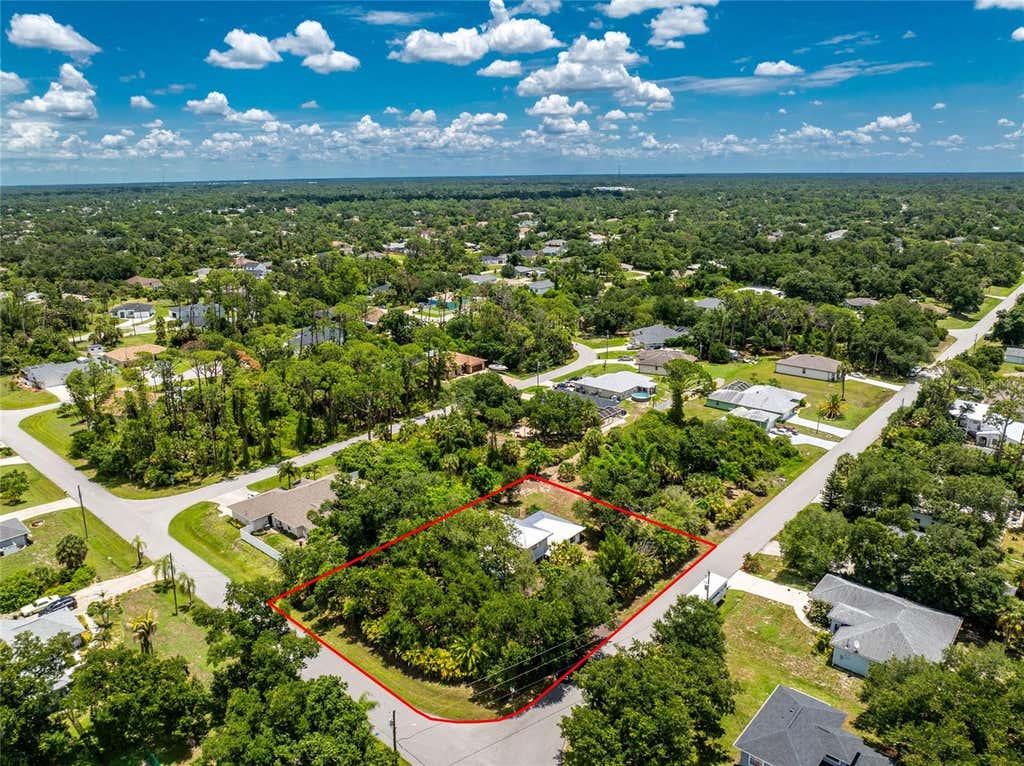 Photo of 4880 Wecoma Avenue, North Port, FL 34287 (MLS # C7527070)