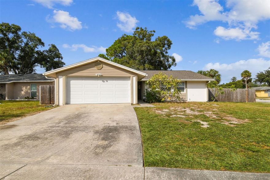 Welcome home to this charming and beautiful 3 bed 2 bath house situated on an oversized corner lot. This centrally located home in Town and Country features an open floor plan and plenty of windows giving it a light and bright feel throughout. Enjoy many family gatherings in this very spacious chef's delight kitchen! Relax and enjoy your privacy in the huge fully fenced backyard which includes a storage shed and an extra wide aluminum gate perfect for an RV or boat storage! With wood laminate throughout and NEW carpet in the bedrooms, this 1,169 square foot FRESHLY PAINTED abode has many renovations and upgrades. Master bath remodel done in 2015! The WINDOWS and SLIDER were replaced in 2012! FULL A/C REPLACEMENT in 2018 including Duct Work! BRAND NEW ROOF completed in Oct. 2023 comes with a transferrable warranty! Water/Sewer Pipe Replacement in 2012! NEW Garage Door and Opener 2022! Convenient to Tampa International Airport, Downtown Tampa, International Plaza, Veteran's Expressway, Westshore District, Riverwalk, shopping, restaurants and all that Tampa Bay has to offer! Schedule your private showing today!