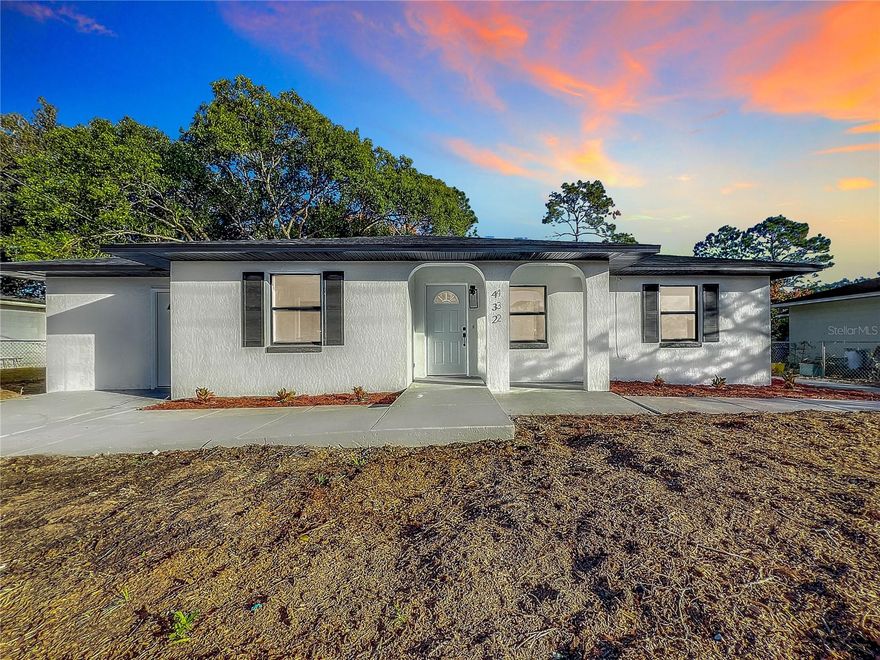 Come discover this beautifully updated 3-bedroom, 2-bath home, just under 30 minutes from Orlando's theme parks. Includes brand new roof with 15 year transferable warranty, brand new Rheem A/C unit with 10 year warranty, new tile flooring, new soft close kitchen cabinets with granite countertops, new Whirpool appliances, freshly painted (inside, outside, walkways and driveway), enclosed lanai porch, and huge versatile bonus room with separate entrance. The home sits on a big fenced lot with car access through the left side and paved walkway on the right side. Best of all, a quiet and peaceful neighborhood with no HOA. This is an absolute steal!