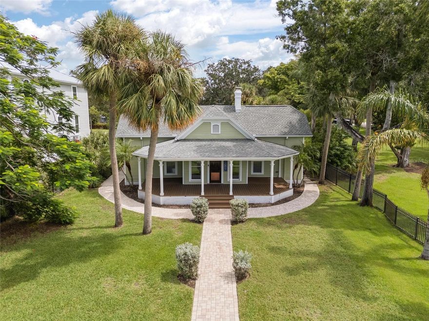 Welcome to the crown jewel of Tarpon Springs and an area of Spring Bayou known as the "Golden Crescent".  Founded in 1887, Tarpon Springs is not short on history, character and beautiful historic homes! This home was barged down the coast from Vermont and features original heart of pine floors. If there was a blend between historic charm and modern features this home has it all. With three bedrooms, two baths, broad covered porches (both front and back), a chef's kitchen and tall ceilings, this home has a lot of space to live, host and entertain. Enjoy the spanning waterfront views from inside, or the oversized front porch where you may enjoy the Holiday Boat Parade, the Epiphany and various festivals that take place directly across Spring Bayou at Craig Park. On your private dock you have the convenience of solar power and water, a boat lift with a roof for shade and could come with the boat in place!  Enjoy the screened in back porch and cabana area featuring a large salt water pool! Watch a football game, serve cocktails and cookout! The cabana has a half bath and there is also an outside shower. The back porch is pre plumbed for an outside kitchen. Store your boating gear or bikes in the detached shed. Tarpon Springs is a great place to live and hosts many festivals throughout the year and is home to gorgeous community beaches and waterfront parks. This property is a short stroll to everything including a thriving downtown with First Friday festivals monthly, coffee shops, breweries, boutiques, and fine dining as well as the world-famous Sponge Docks if you are interested in Greek cuisine and culture and an atmosphere found in the Grecian Isles. Additionally, this property has a large back yard with plenty of room for parking the toys. It's a quick 2-block walk to the Jolly Trolly that you can hop on and off any time to experience the highlights of downtown Palm Harbor, downtown Dunedin / TD Ballpark and Clearwater Beach.  The home has been very well maintained. Please see attachments for an upgrade list. No HOAs.