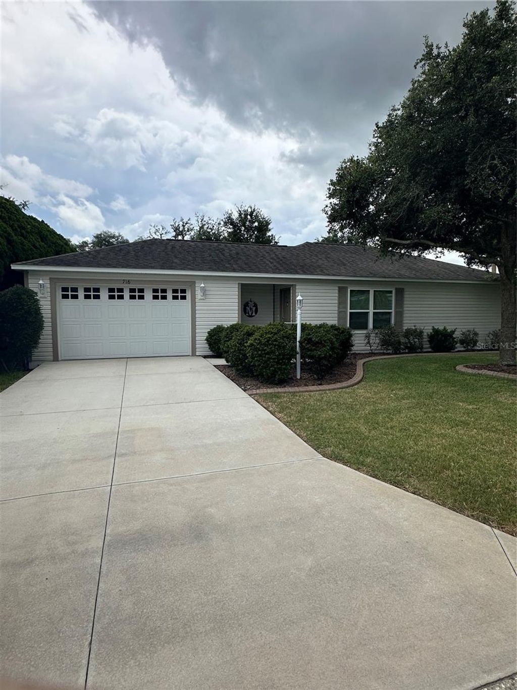 Photo of 716 Truman Avenue, Lady Lake, FL 32159 (MLS # G5113512)