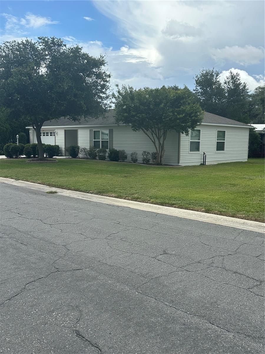Photo of 716 Truman Avenue, Lady Lake, FL 32159 (MLS # G5113512)