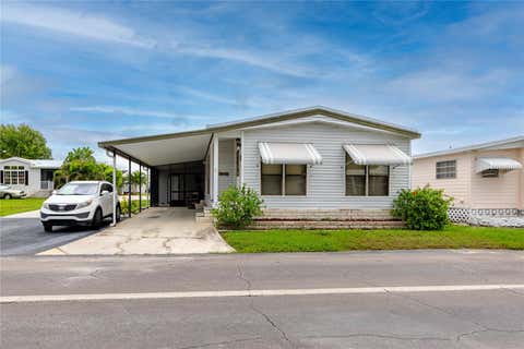 Photo of 6821 Americana Drive NE #106, St Petersburg, FL 33702 (MLS # TB8536821)