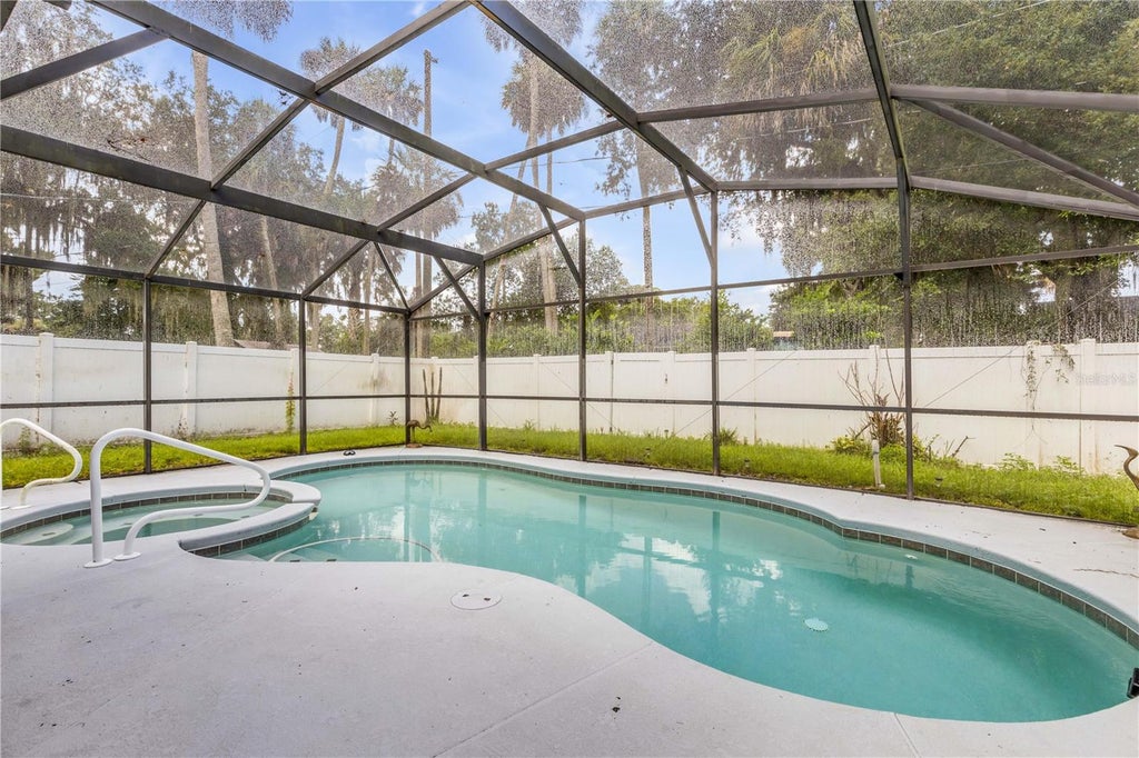 Photo of 1328 Needle Palm Drive, Edgewater, FL 32132 (MLS # O6444682)
