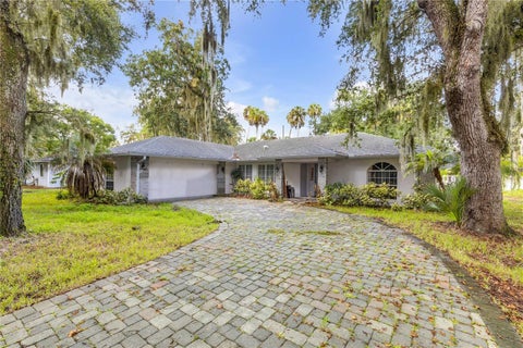 Photo of 1328 Needle Palm Drive, Edgewater, FL 32132 (MLS # O6444682)