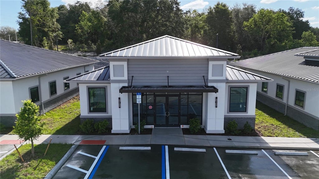 Photo of 2625 Ocoee Apopka Road #7, Apopka, FL 32703 (MLS # O6300773)