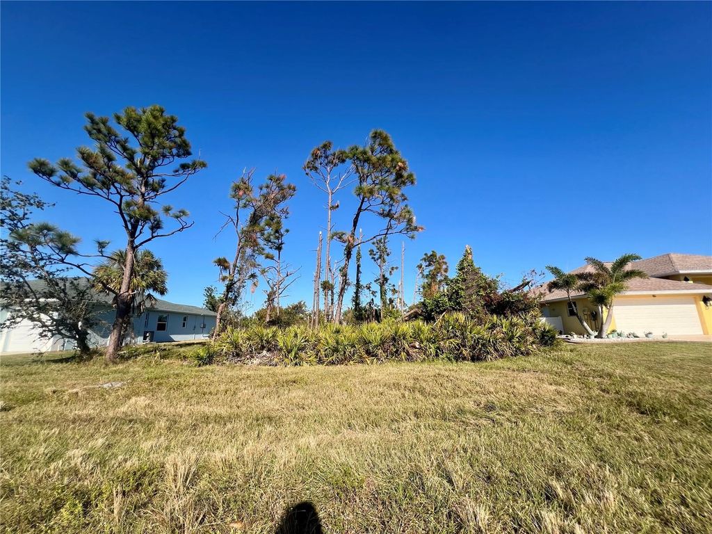 Photo of 84 Fairway Road, Rotonda West, FL 33947 (MLS # C7517905)