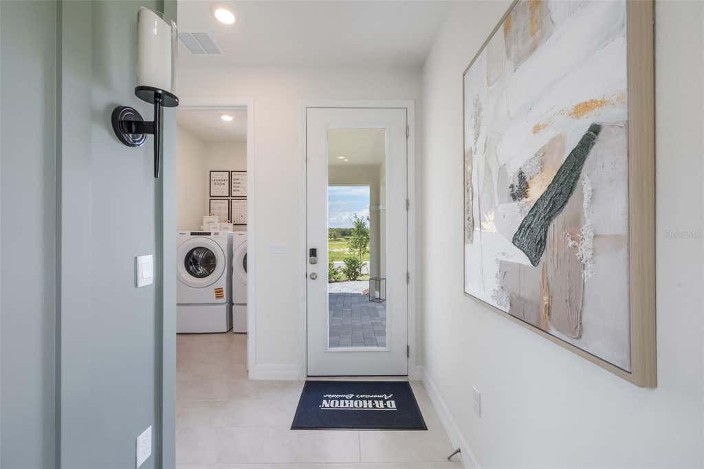 Photo of 3945 Kennebunk Loop, Mount Dora, FL 32757 (MLS # O6435612)