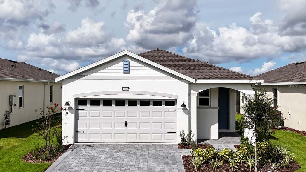 Photo of 3945 Kennebunk Loop, Mount Dora, FL 32757 (MLS # O6435612)