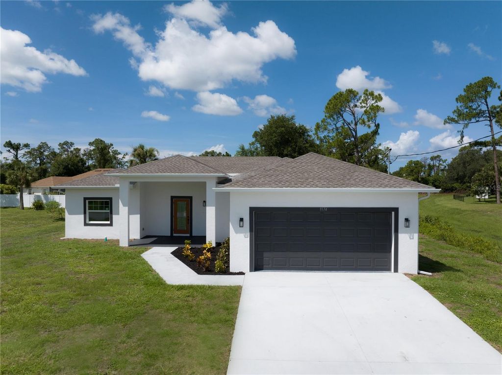 Photo of 5574 Fairlane Drive, North Port, FL 34288 (MLS # C7512388)