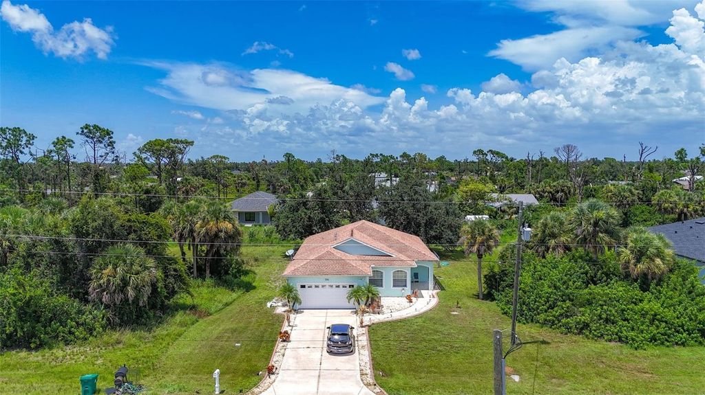 Photo of 394 Sunset Road N, Rotonda West, FL 33947 (MLS # A4661062)