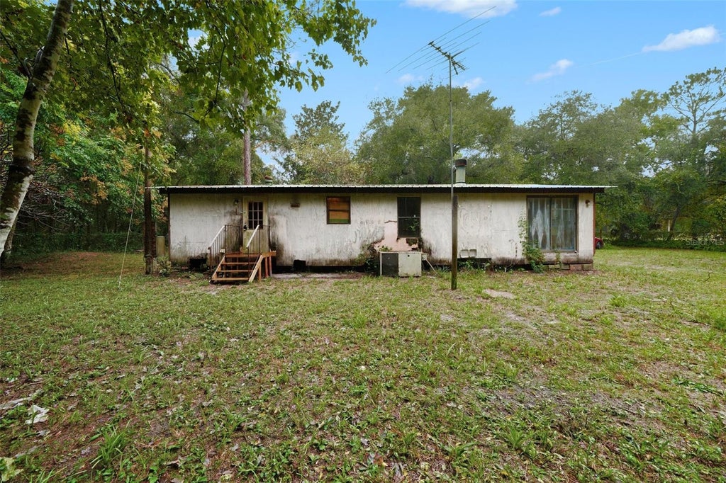 Photo of 114 Shady Oak Drive, Satsuma, FL 32189 (MLS # TB8557670)