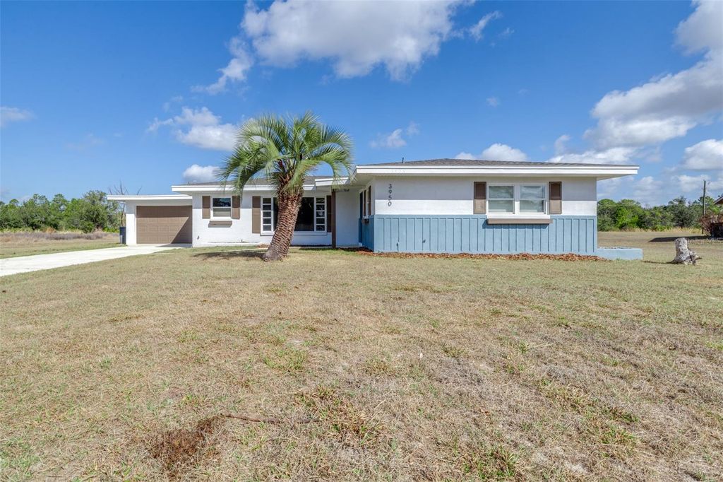 Photo of 3950 Bougainville Drive, Indian Lake Estates, FL 33855 (MLS # TB8478468)
