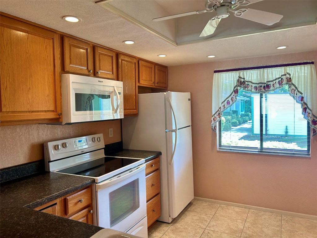 Photo of 2514 Royal Pines Circle #25D, Clearwater, FL 33763 (MLS # TB8503044)