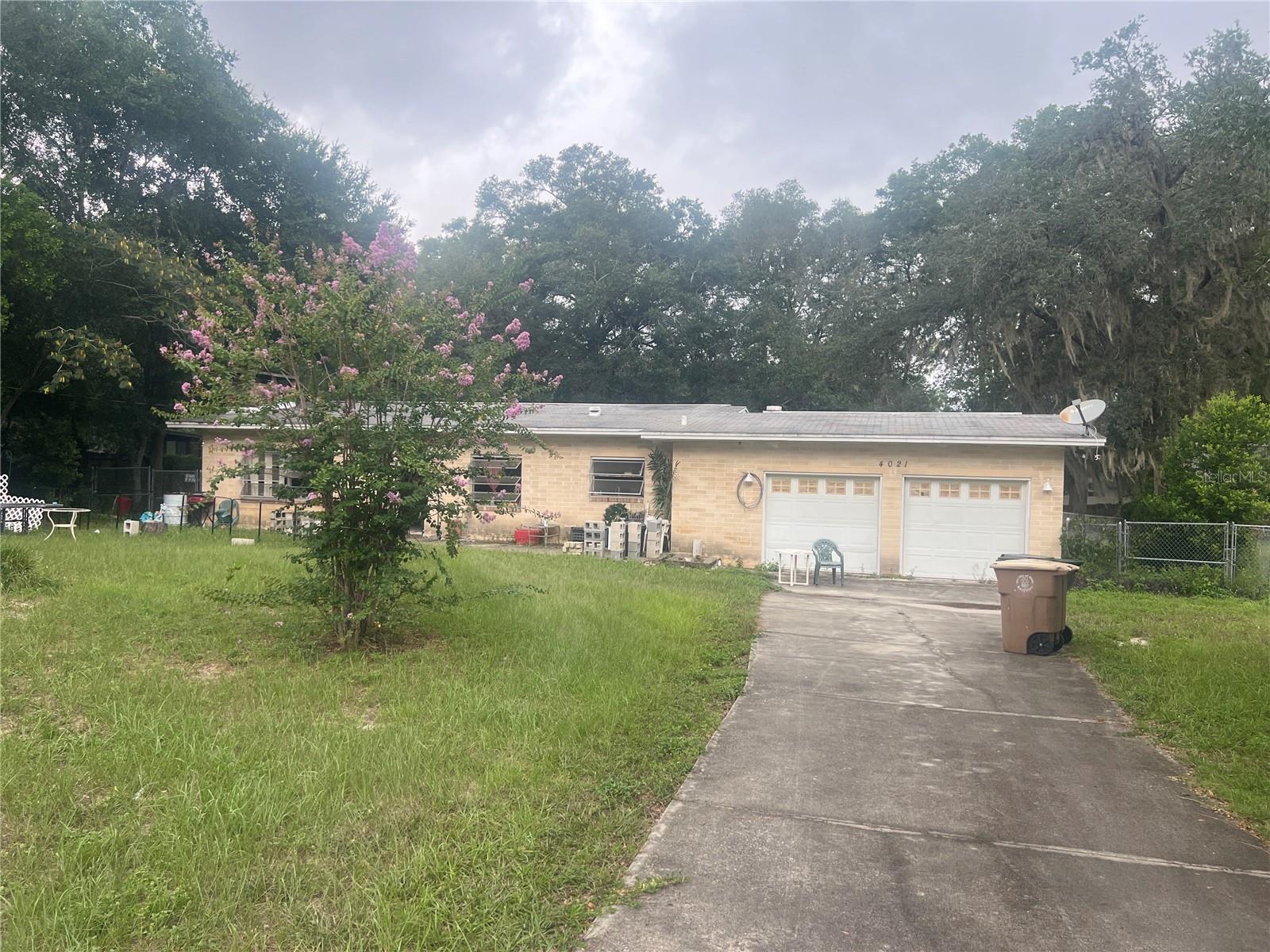 Investor Special! Situated on a spacious .54-acre lot within city limits, this 3BR/1.5BA home with a 2-car attached garage plus a detached 1-car garage offers 1,518 sq. ft. of living space. Currently tenant-occupied through 9/1/2025. Electrical system updated in 2015. Excellent fix-and-flip or long-term investment opportunity with strong upside potential.